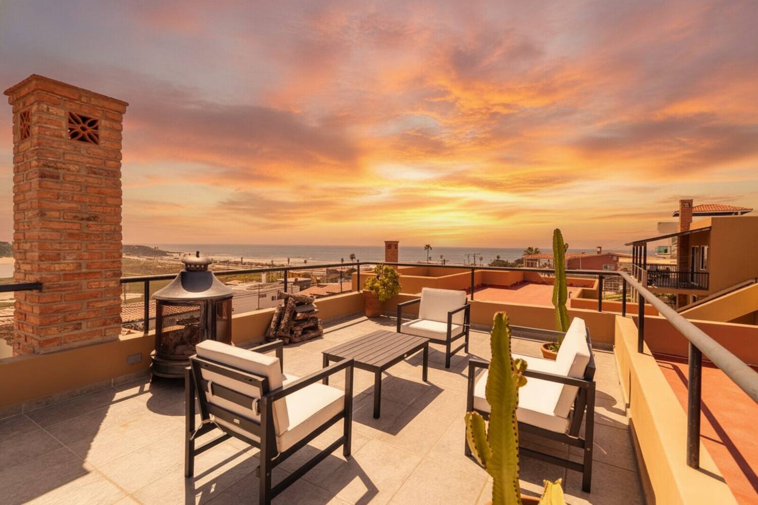 Rooftop terrace at golden-hour sunset over the Pacific, La Misión #159