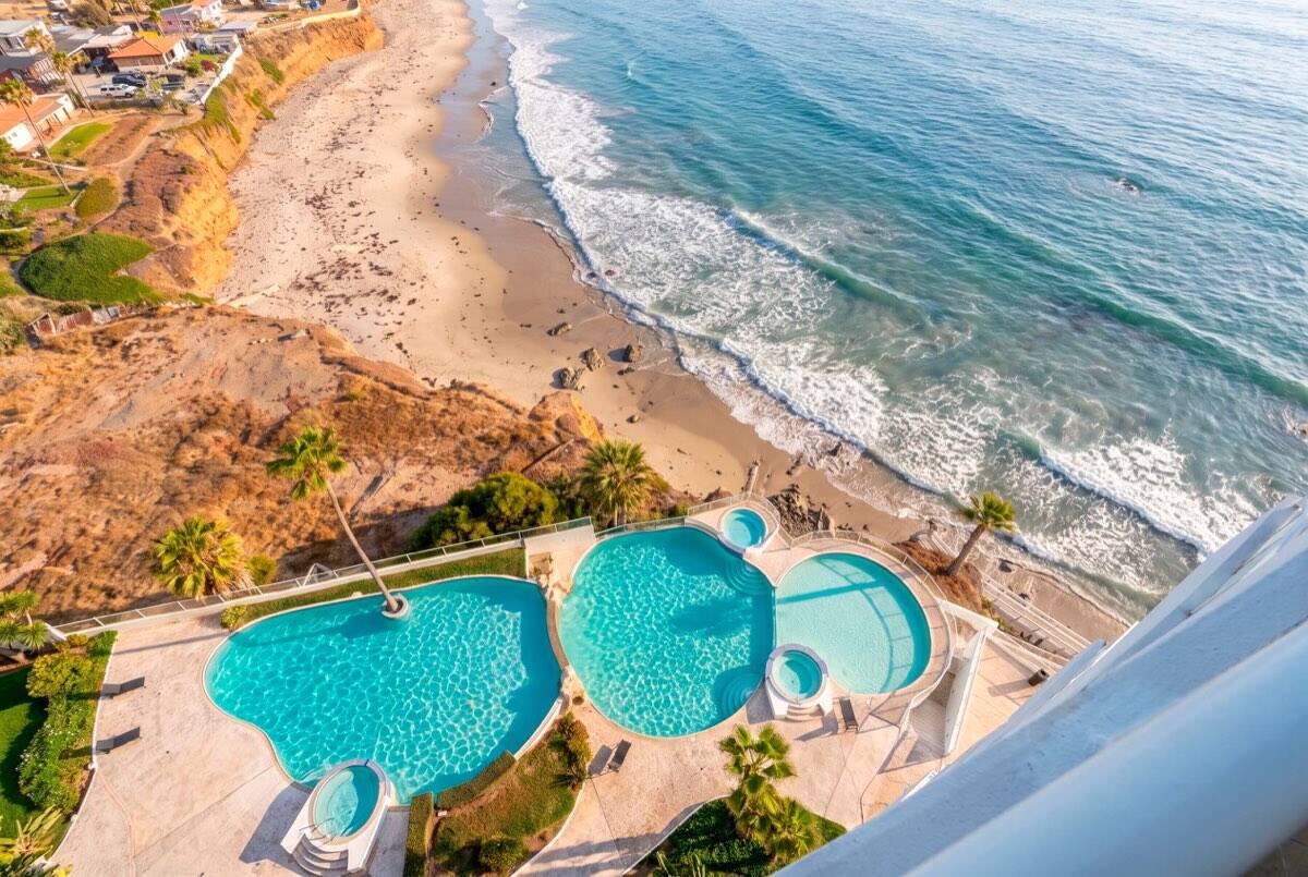 The community pools beside the beach from above