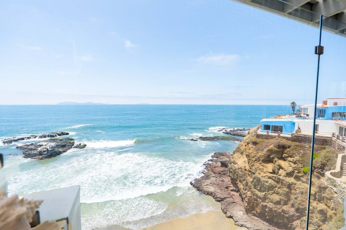 The Pacific coastline below the home