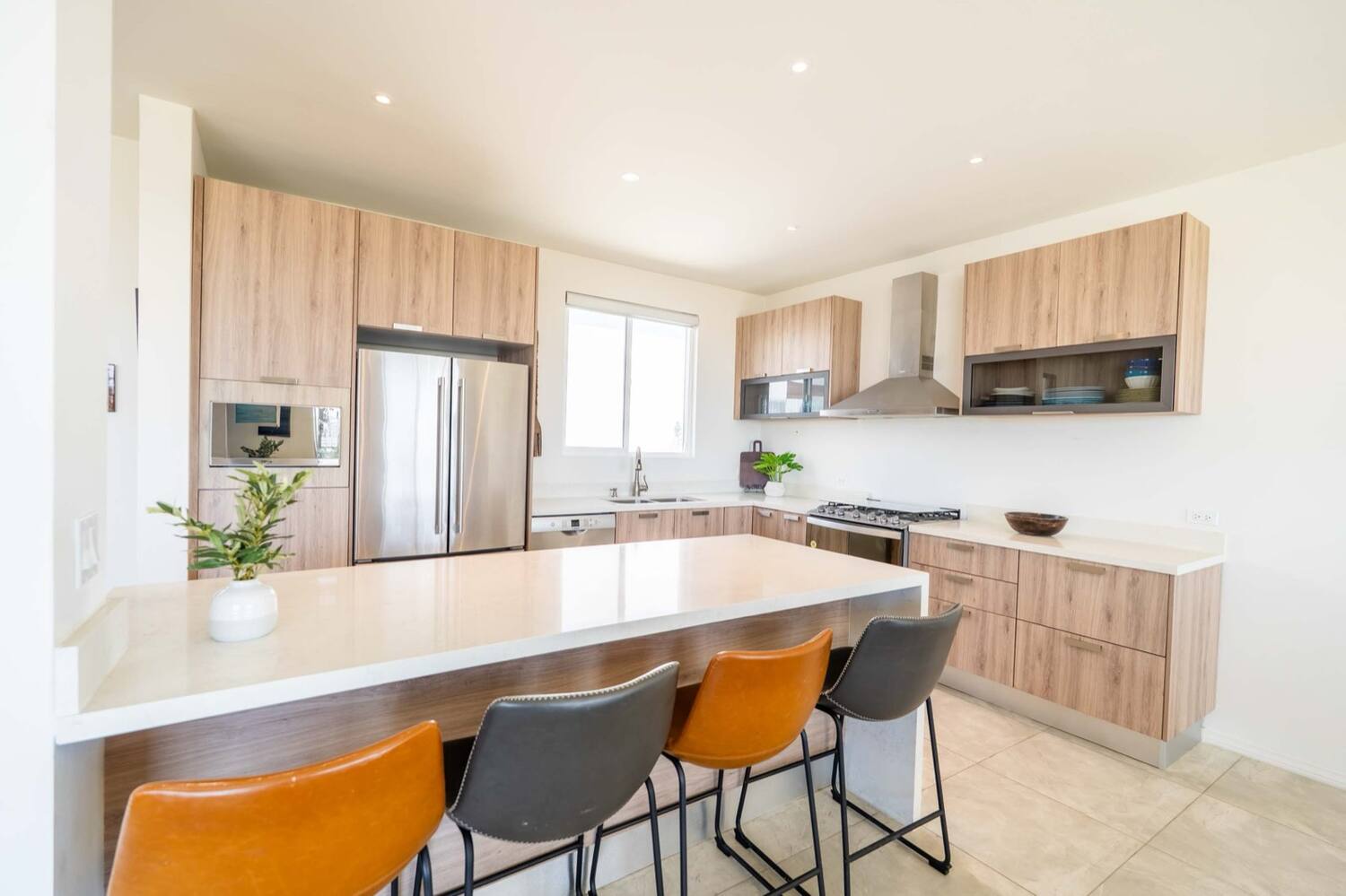 Open kitchen with island seating for four
